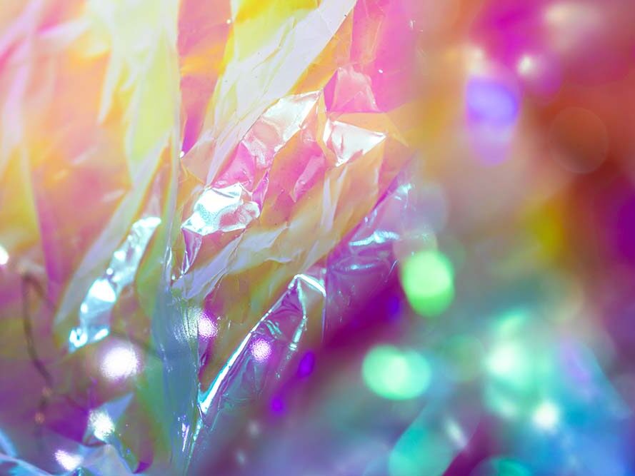 Colorful abstract close-up with iridescent light reflections
